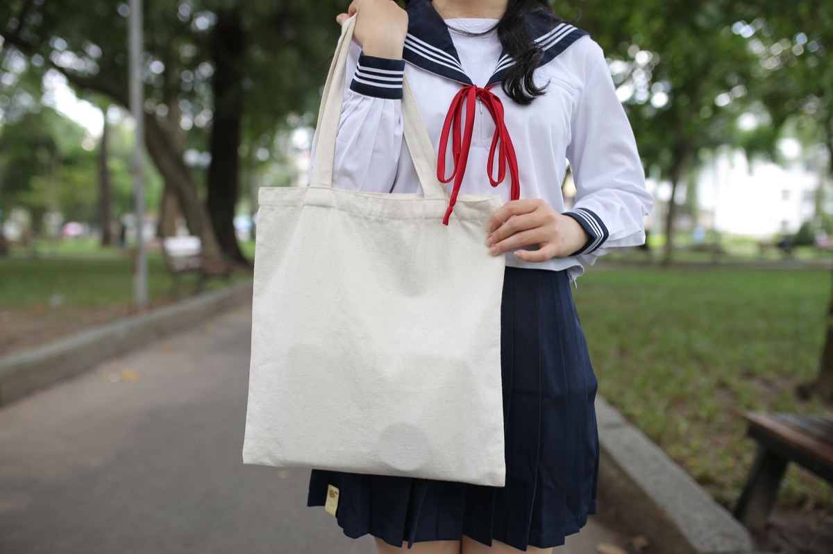 tote bag with adjustable straps and structured design